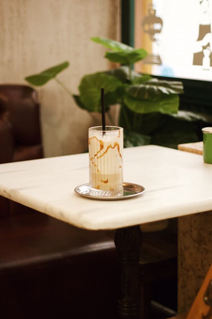 Coffee in glass on table