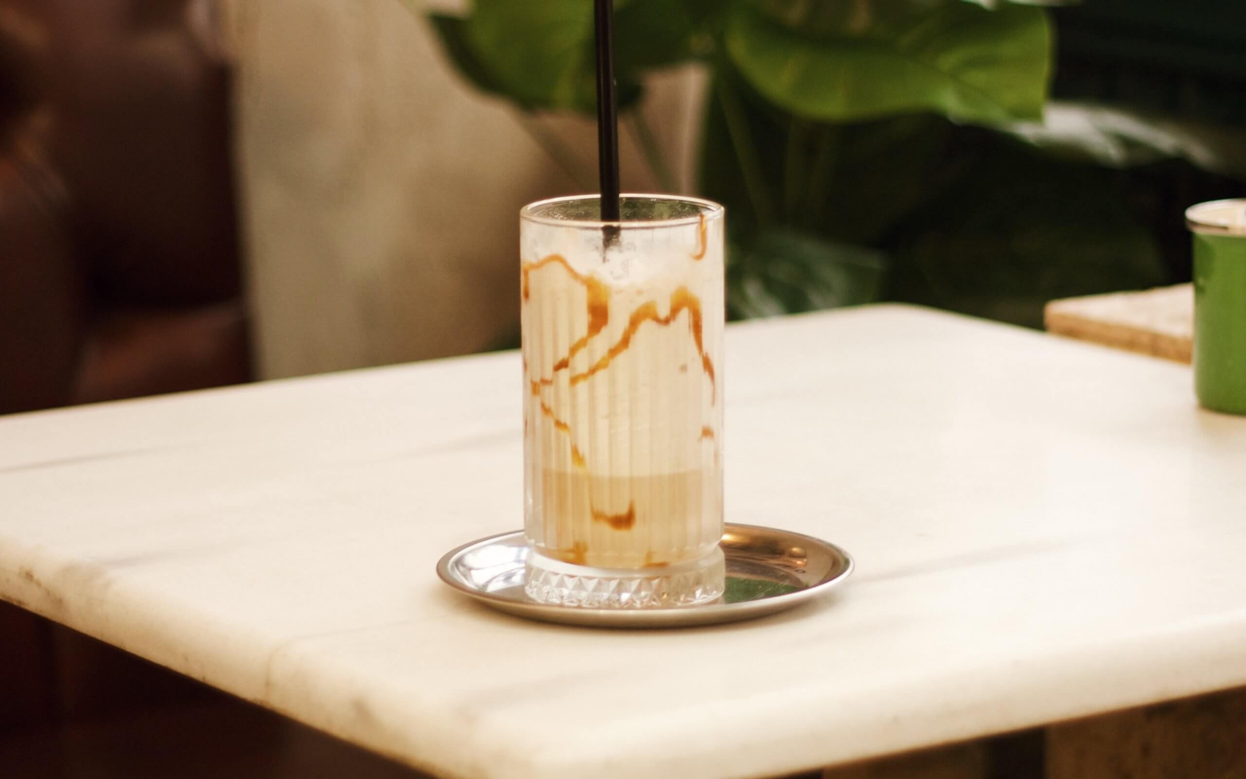 Coffee in glass on table