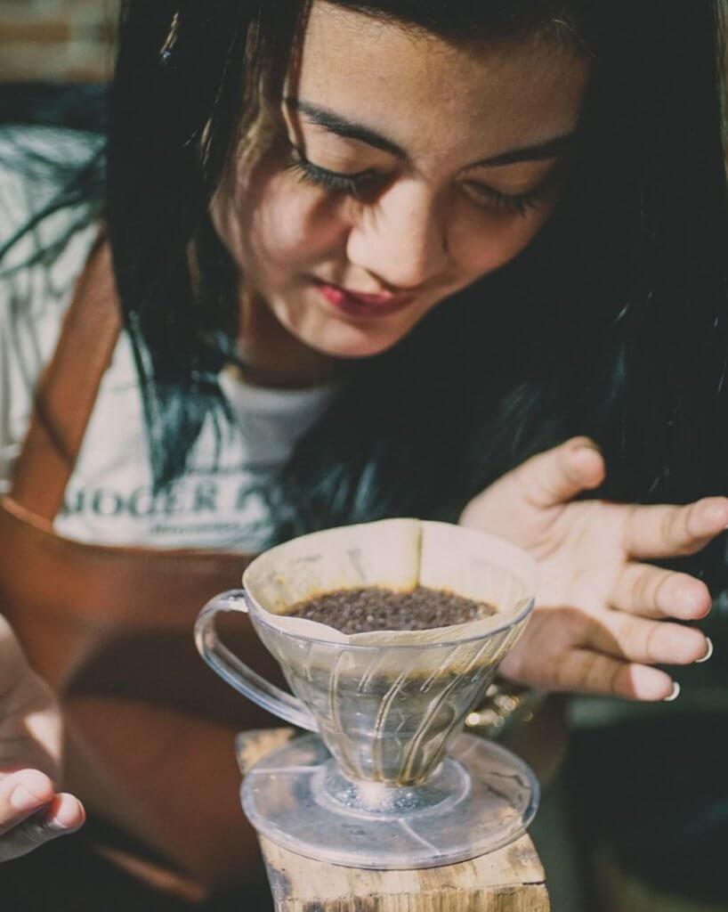 Barista with pour over coffee